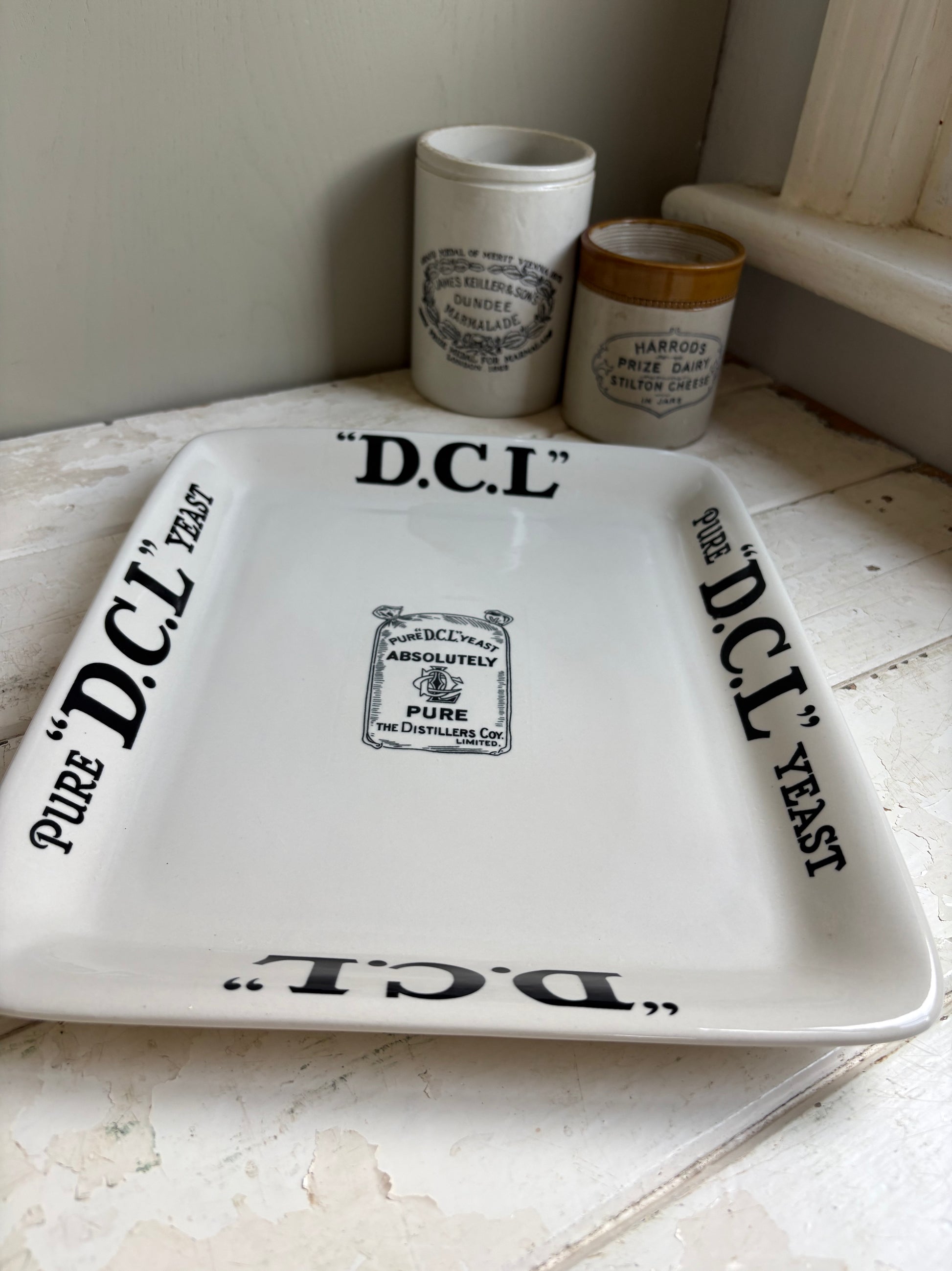 Top view of English ironstone DCL Yeast advertising shop counter display plate with jam pots