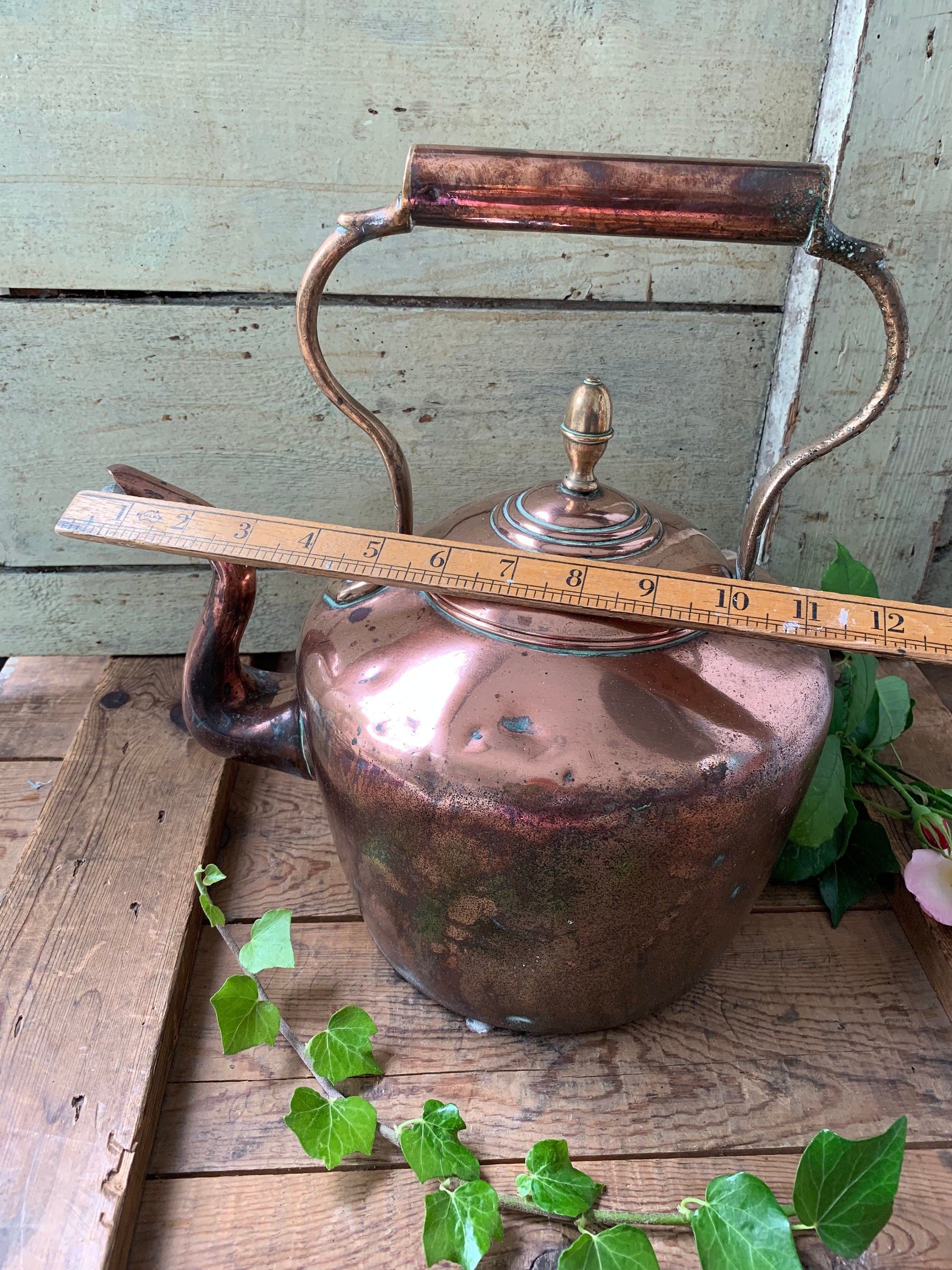 Large antique copper kettle