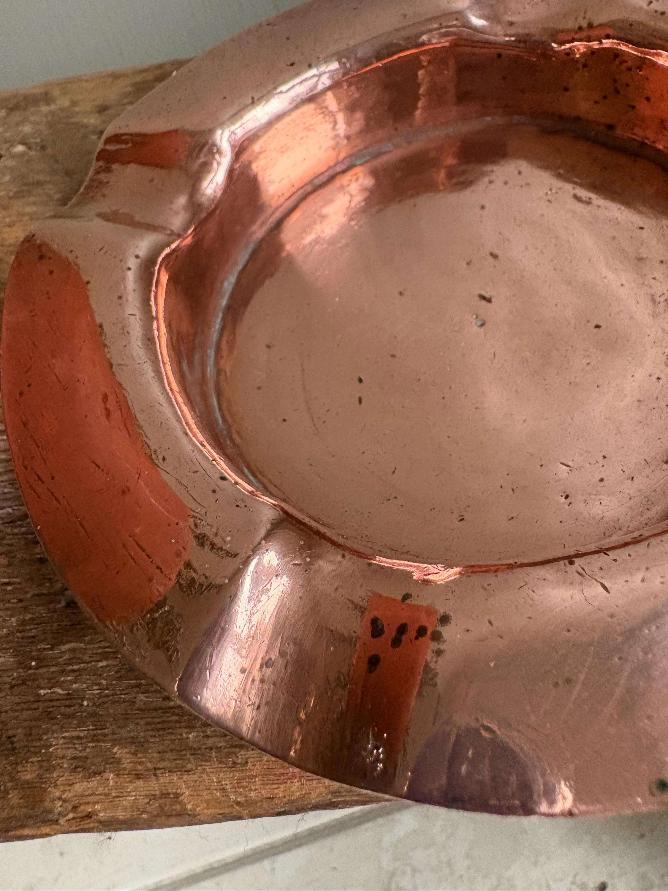 Two Copper Ashtrays