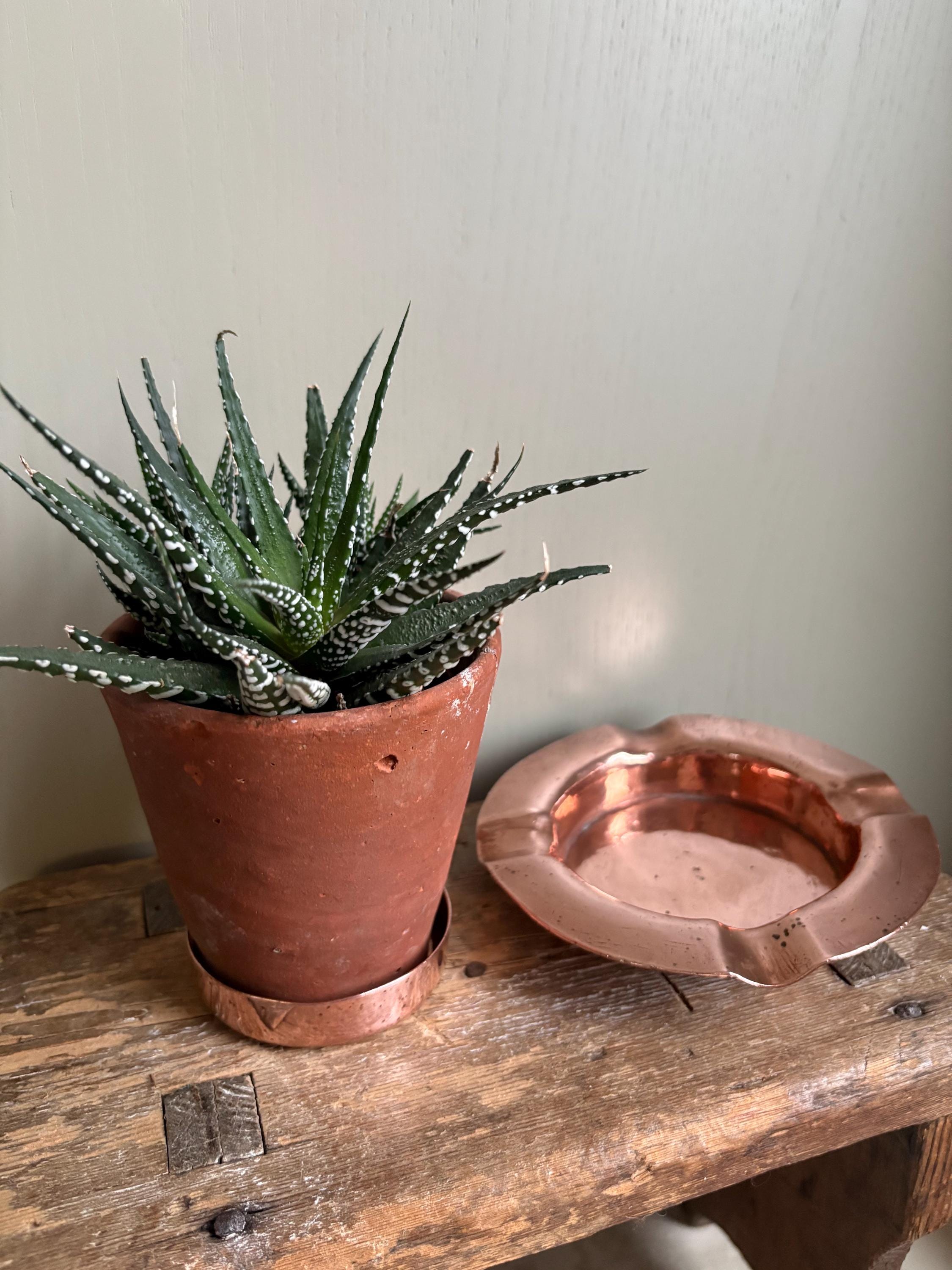 Two Copper Ashtrays
