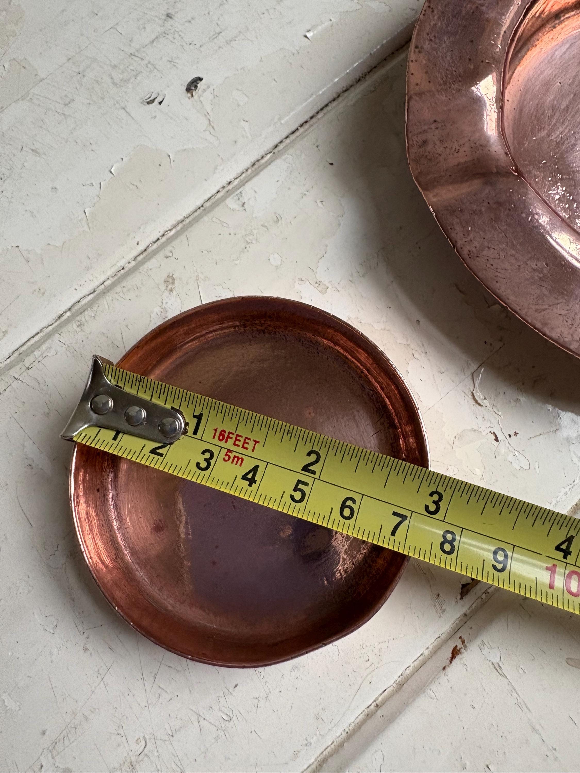 Two Copper Ashtrays