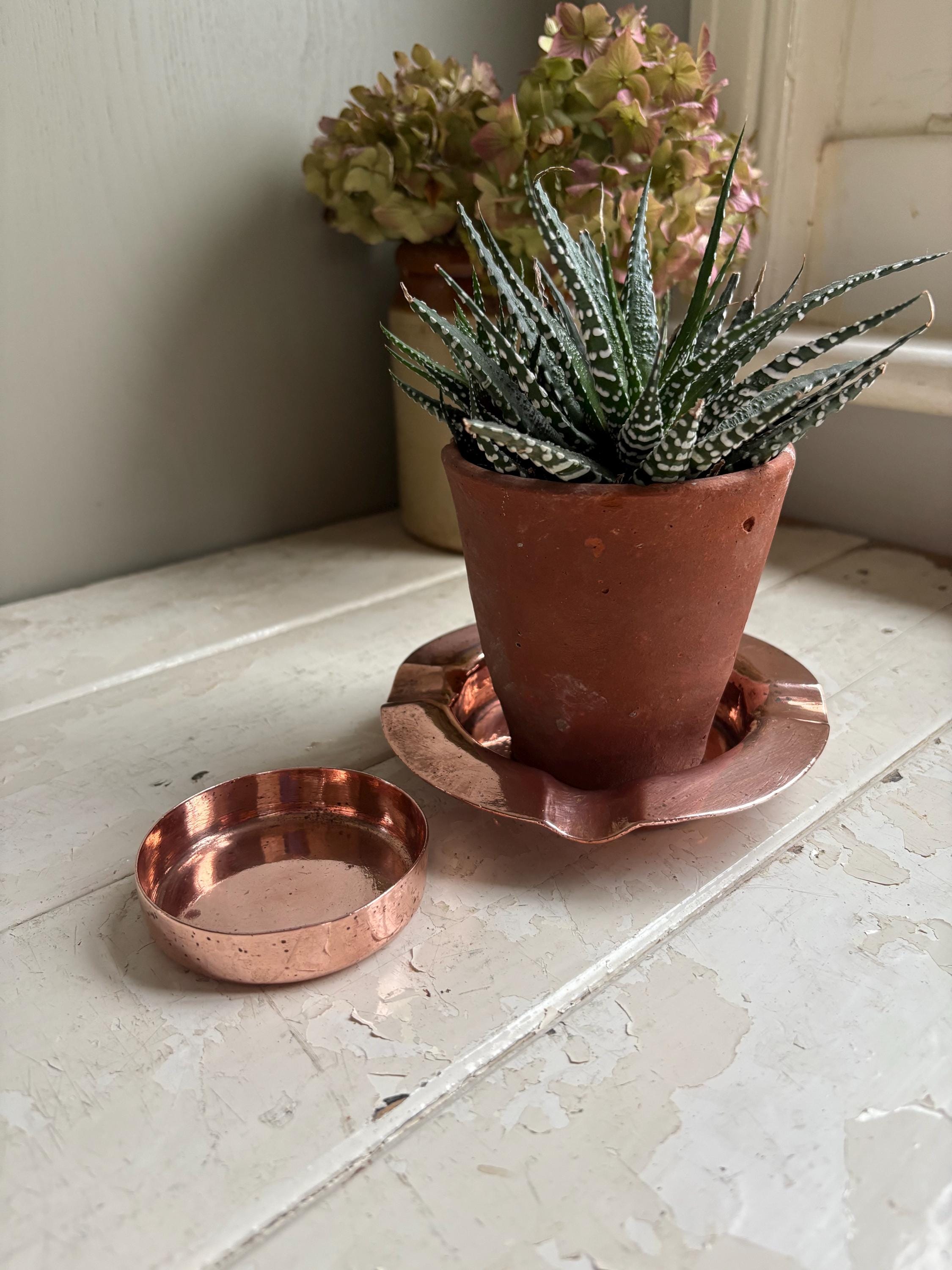 Two Copper Ashtrays