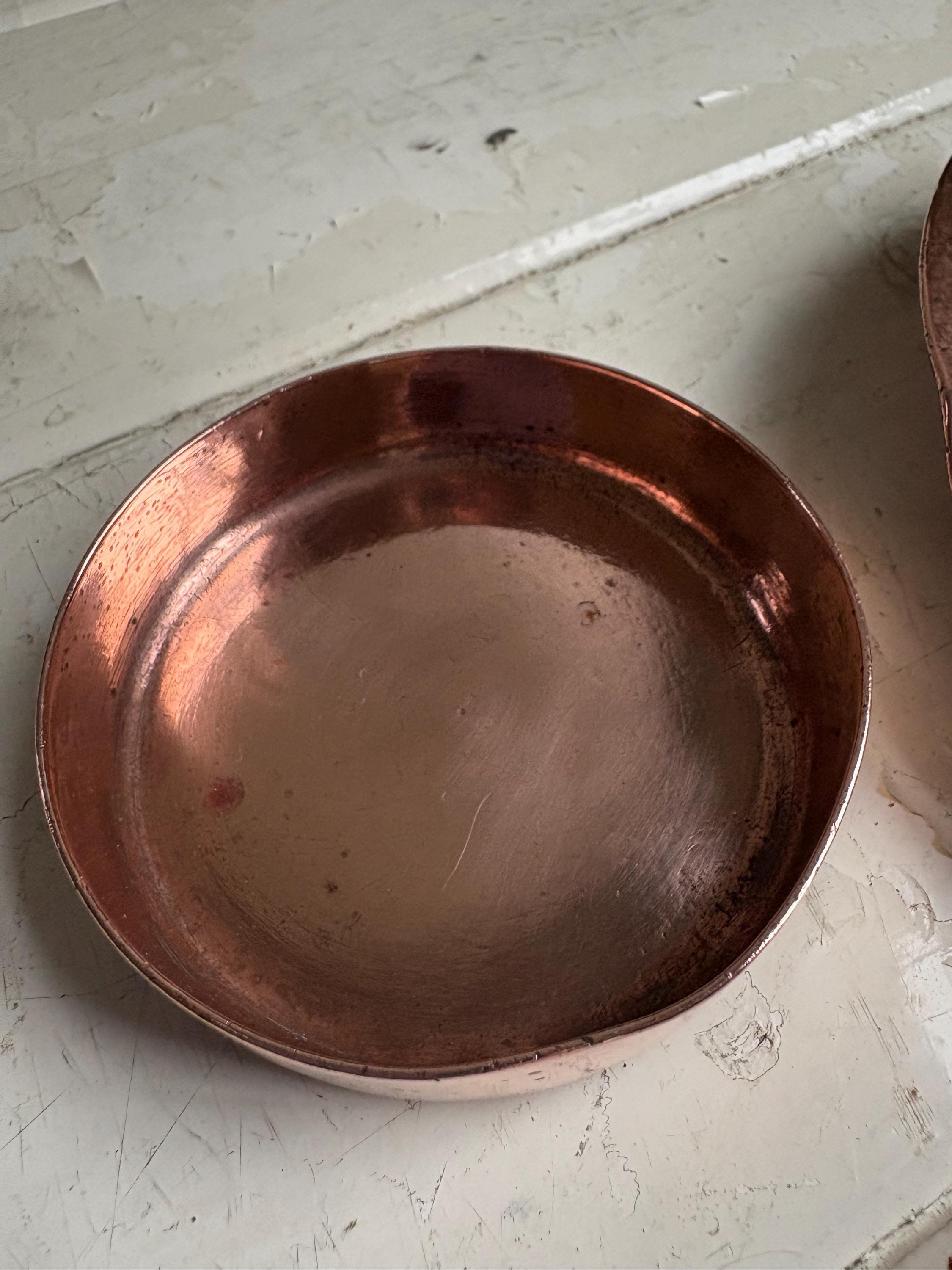 Two Copper Ashtrays