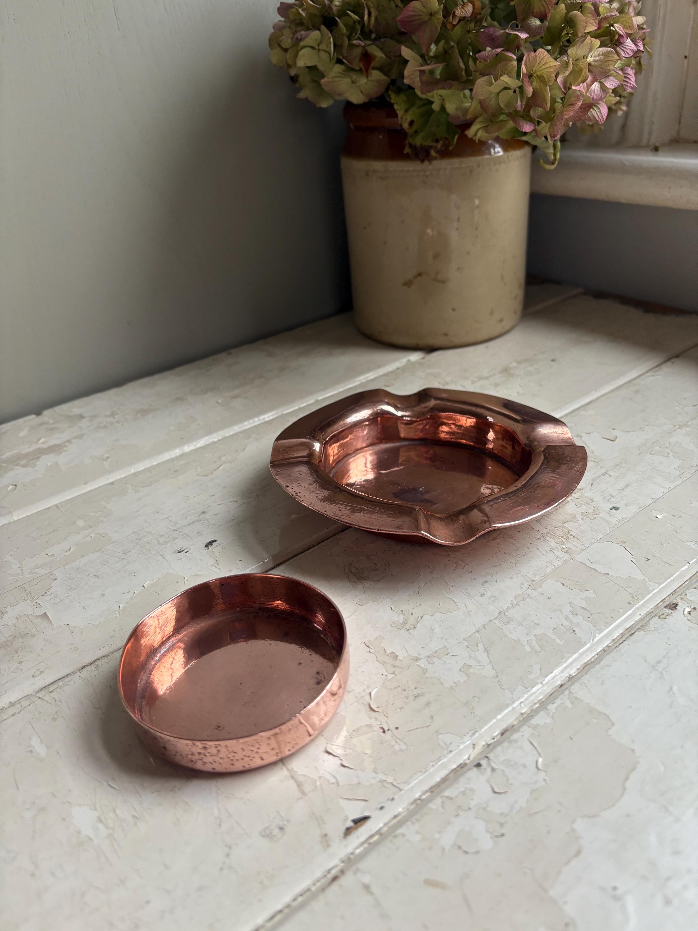 Two Copper Ashtrays