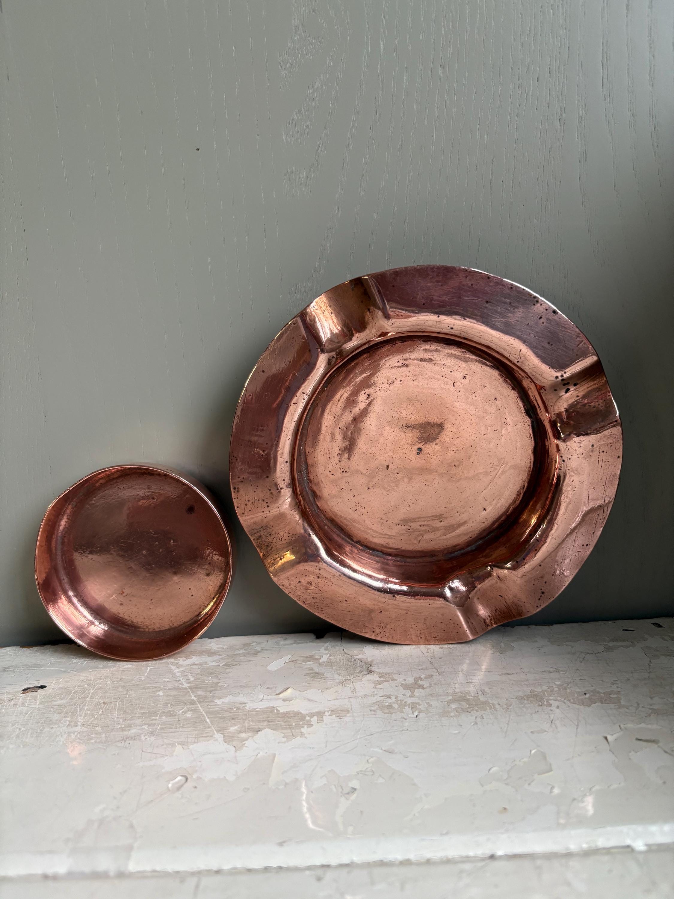 Two Copper Ashtrays