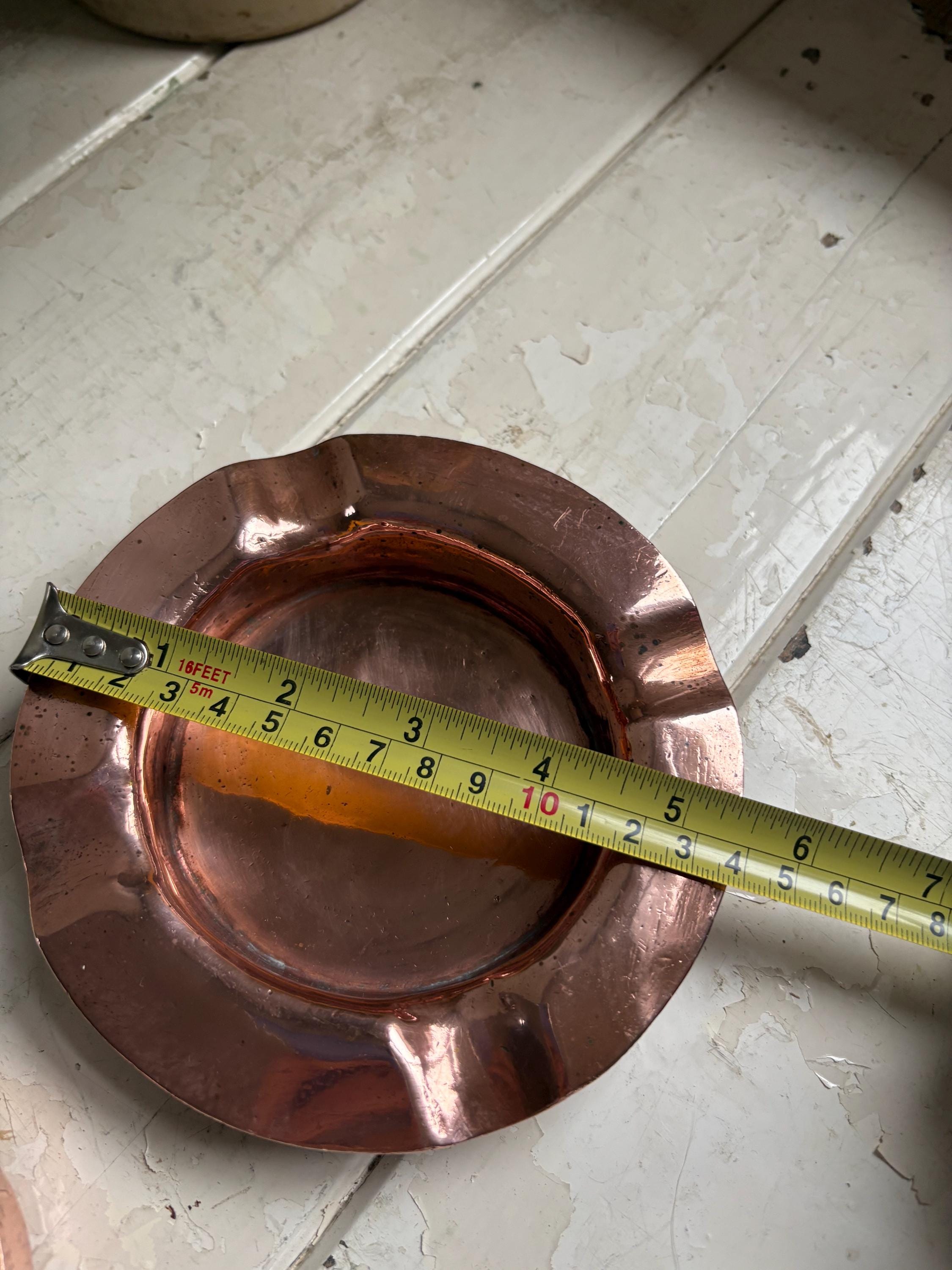 Two Copper Ashtrays