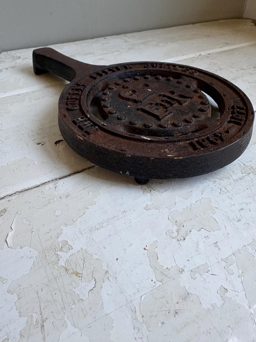 Silver Jubilee Cast Iron Trivet.