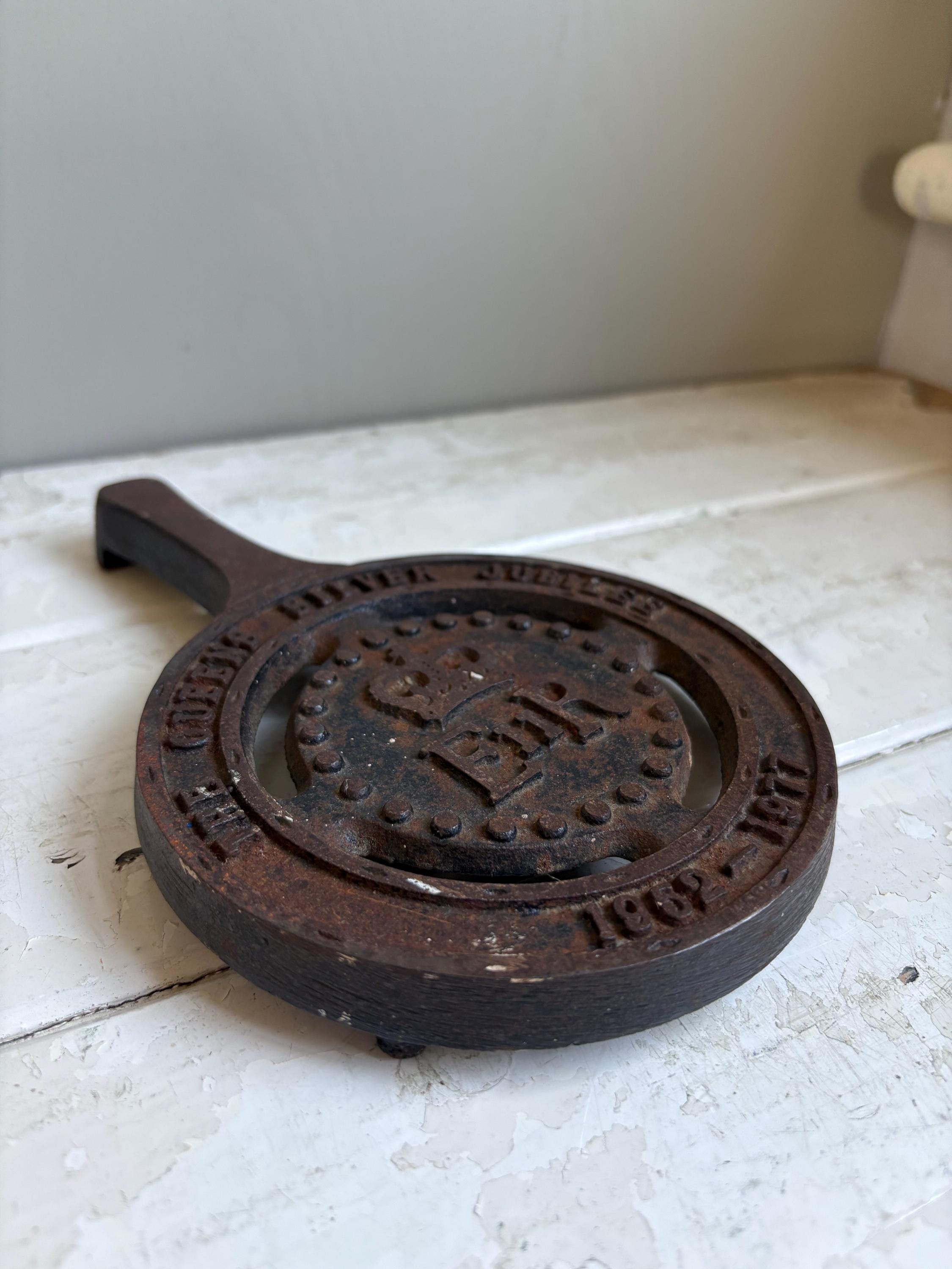 Silver Jubilee Cast Iron Trivet.