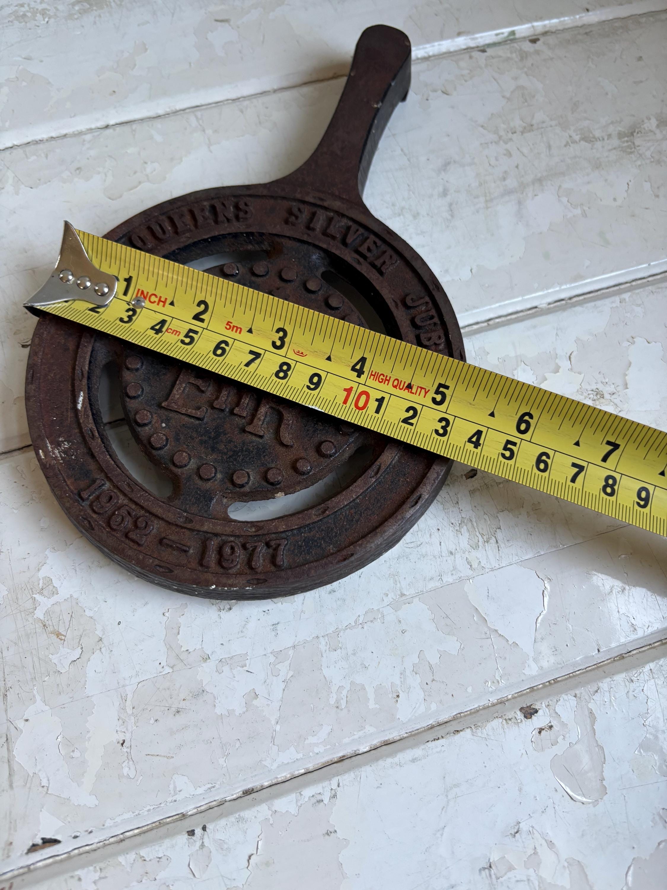 Silver Jubilee Cast Iron Trivet.