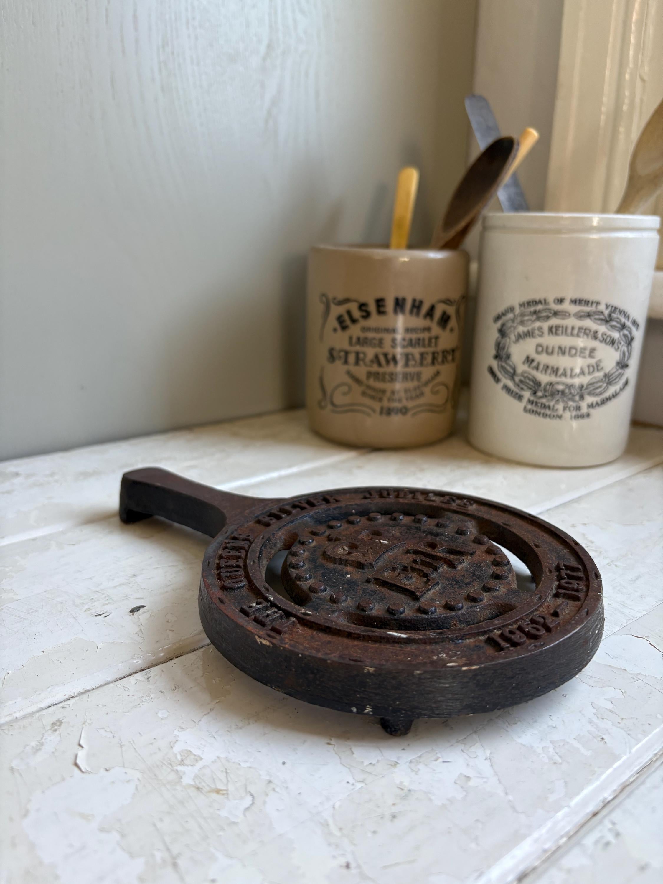 Silver Jubilee Cast Iron Trivet.