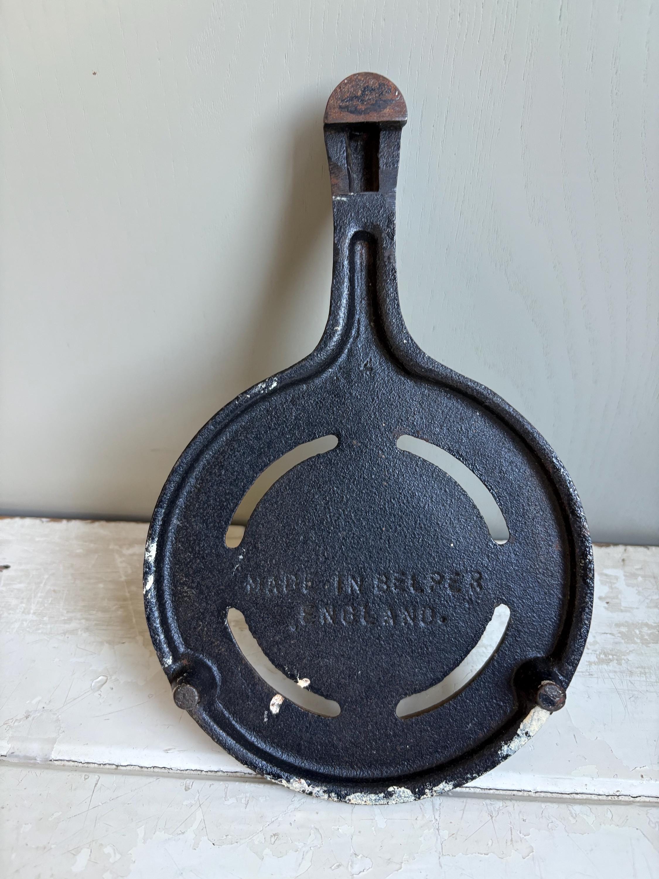 Silver Jubilee Cast Iron Trivet.